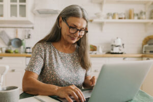 Woman who had breast cancer researches breast reconstruction revision on the internet