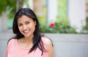 Smiling attractive woman in her 40s looks younger than her age thanks to injectables