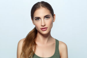 Woman with prominent, beautiful nose has harmonious features after rhinoplasty